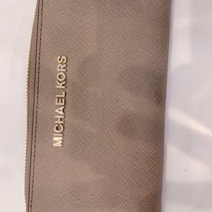 Michael Kors wallet. 7 inch long. Great condition, lots of room.